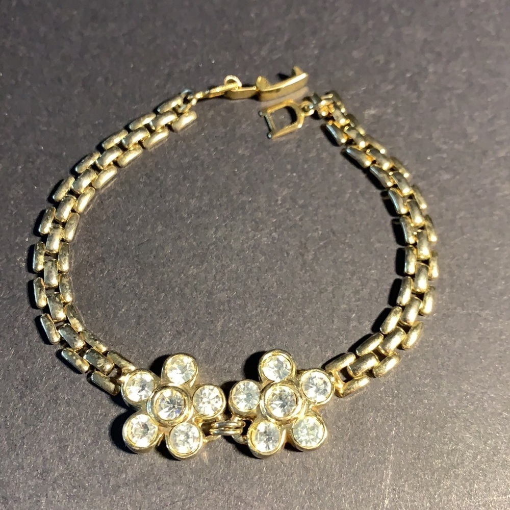 3/$12. Cute gold tone flower bracelet